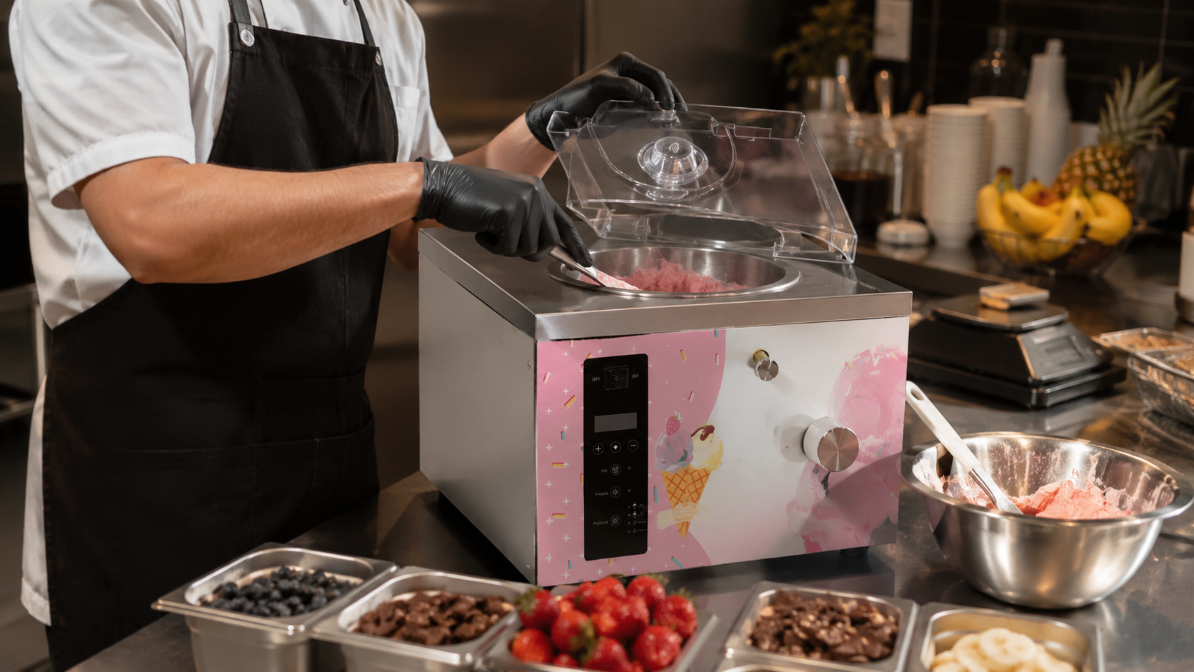 Are Ice Cream Vending Machines Profitable? Cost & Payback 2 Worker stirring pink ice cream mix inside a countertop ice cream machine surrounded by strawberries, chocolate, blueberries, banana slices and a kitchen scale